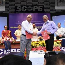 The Union Minister for Minority Affairs, Shri Mukhtar Abbas Naqvi witnessing the signing of MoUs, at the National Conference of Principal Secretaries-Secretaries in-charge of States - UTs dealing with Minority Affairs, in New Delhi on July 16, 2018.